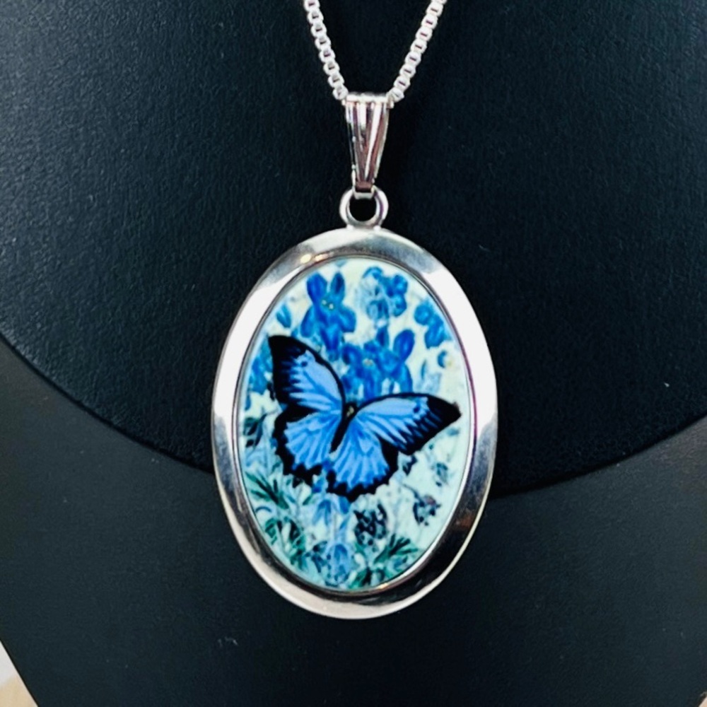 Beautiful Silvertone, blue butterfly pendant costume